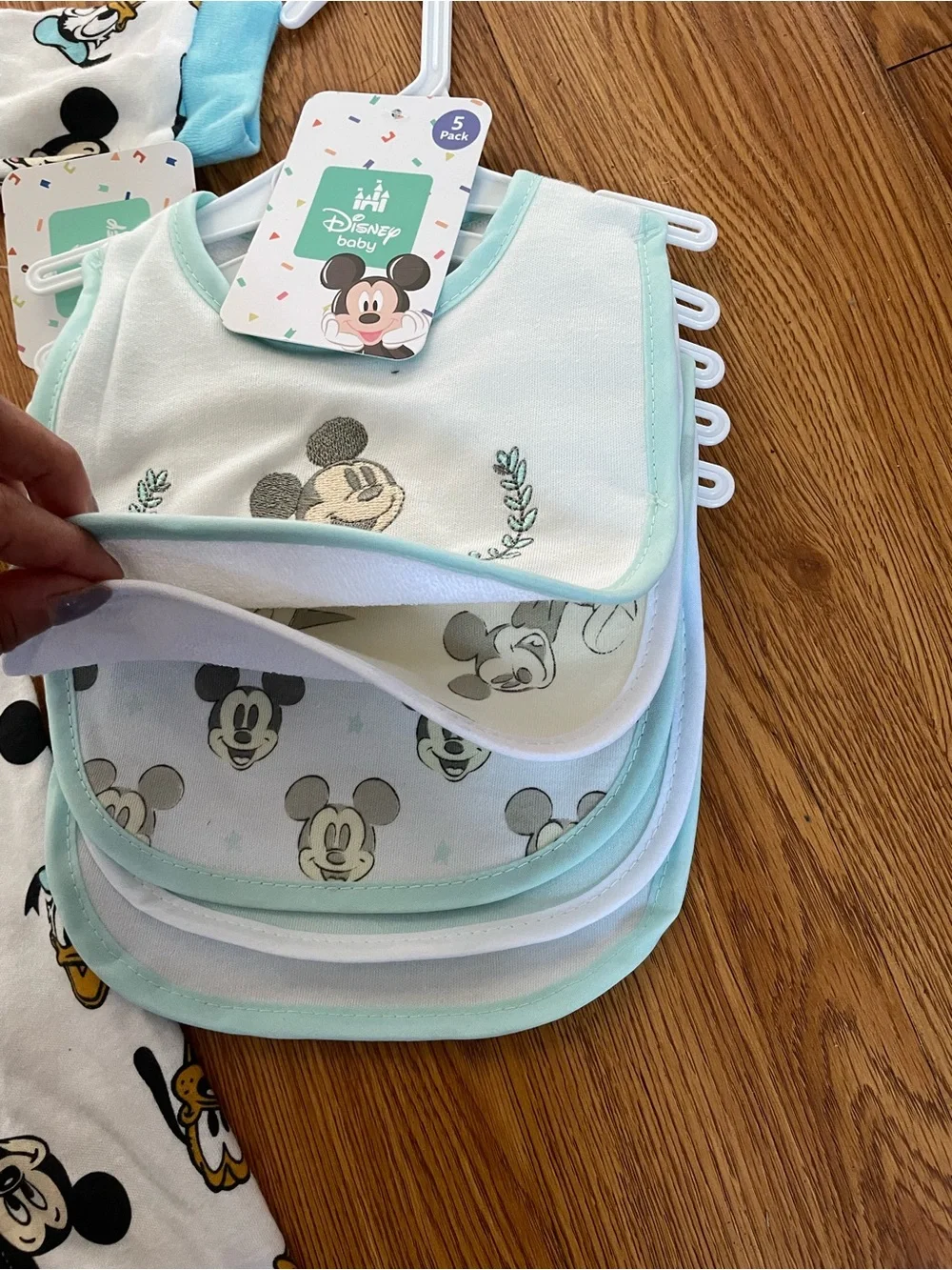 Disney baby footed sleeper and matching bibs